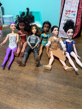Barbie Dolls and assorted princesses and superhero